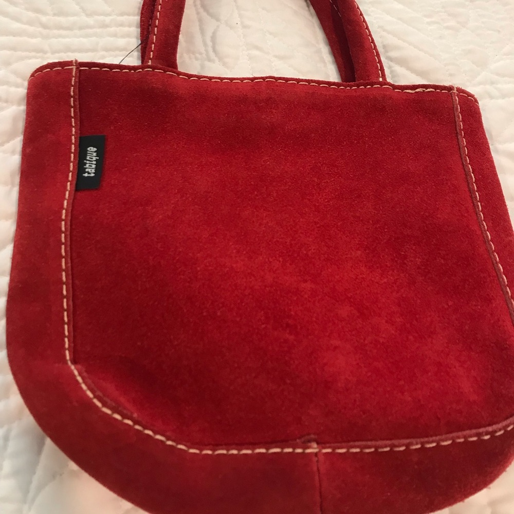 Red leather wrist purse